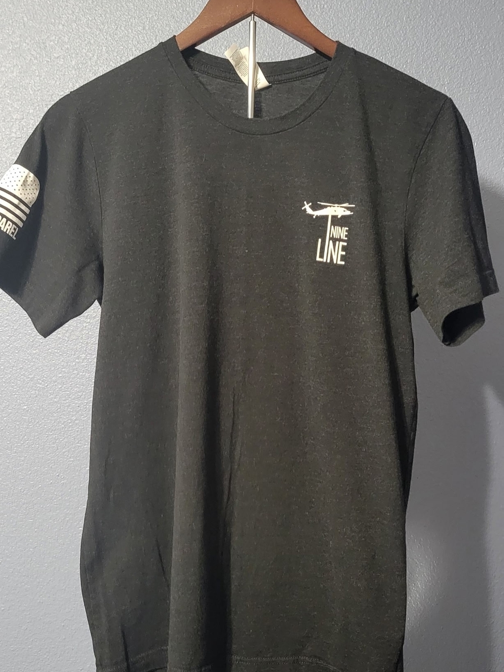 Nine Line Men's Black Graphic Crew Tee with Small Helicopter Logo